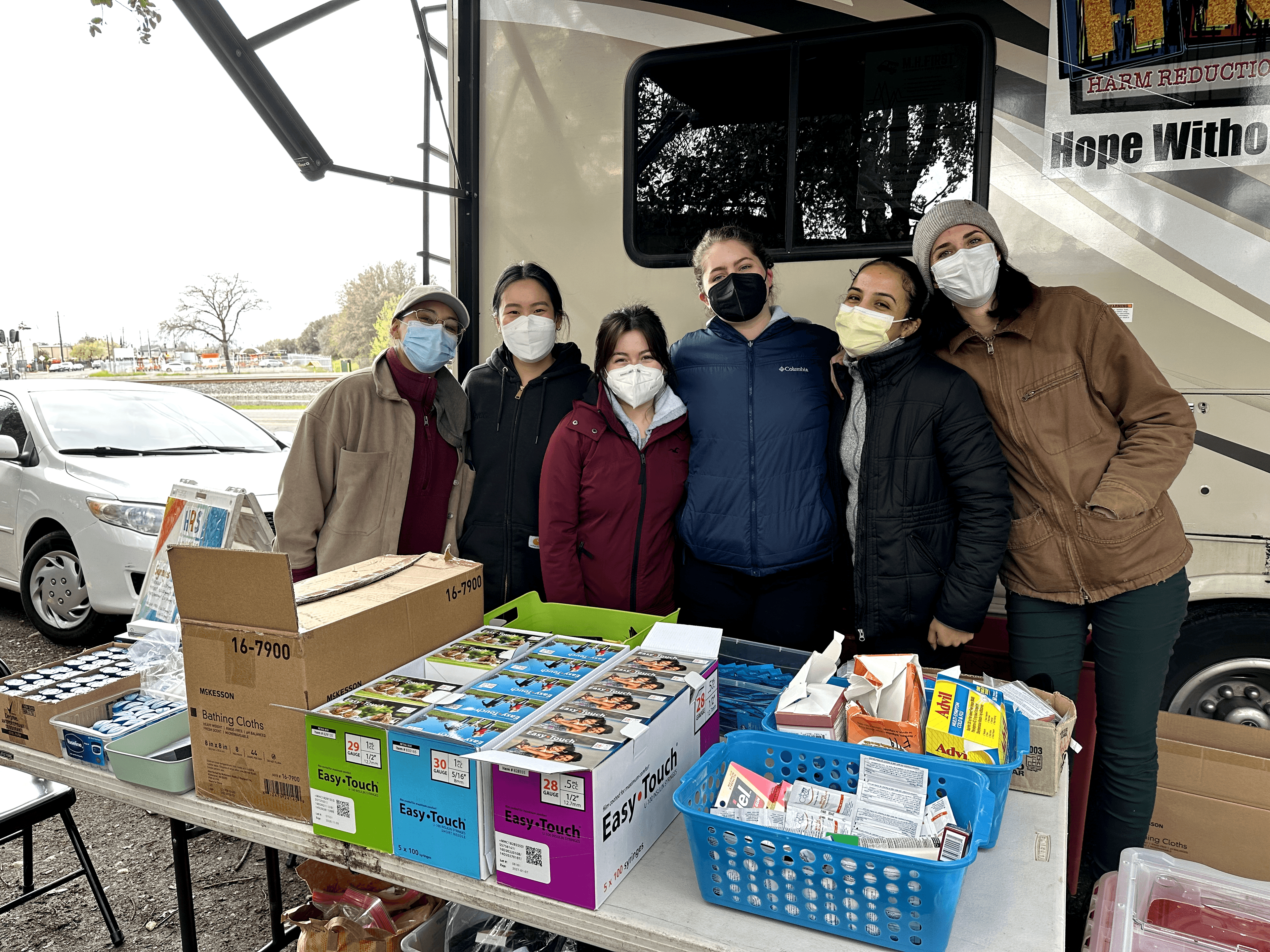 JVMC volunteers posing at a drive in Sacramento